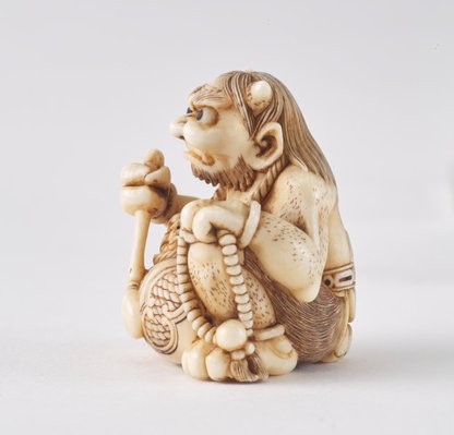 Alternate image of Netsuke in the form of a demon chanting a Buddhist sutra by 