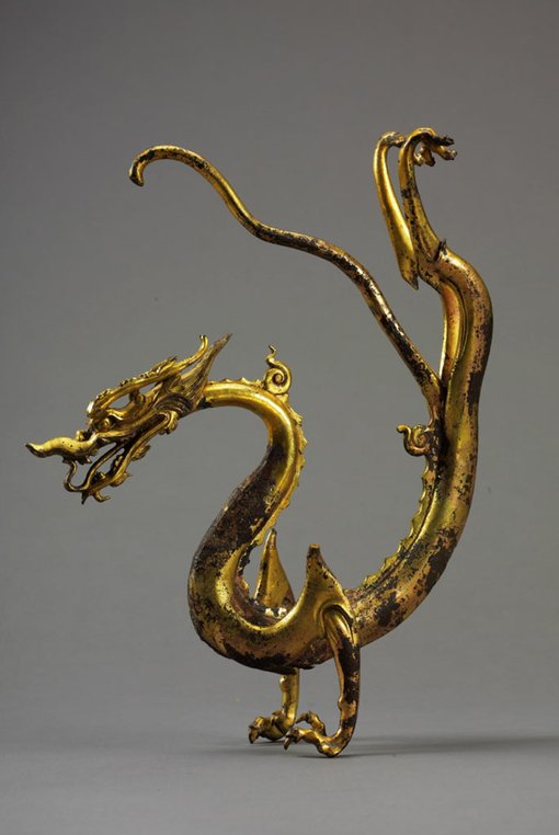 	Dragon c700sgilded bronze with an iron coreunearthed from Caochangpo in the southern suburb of Xi’an, 1975Shaanxi History Museum