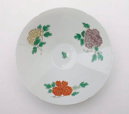 Alternate image of Bowl with floral design and six foliations at rim by 