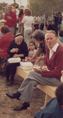 Alternate image of Untitled (Old man, old woman and crowd eating at picnic. Yarraville sugar festival) by Merryle A Johnson