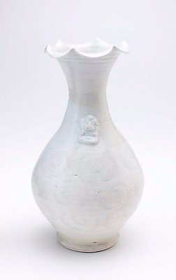 Alternate image of Vase with wide scalloped mouth, carved decoration to body, and two lion marks applied to shoulder by Jingdezhen ware