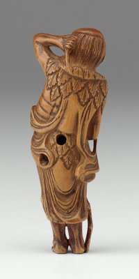 Alternate image of Netsuke in the form of a 'sennin' (mountain recluse) holding his hair and a staff by 