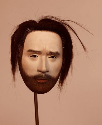 Alternate image of Portrait of the master mask maker Yasuo Miichi wearing a mask of the artist Simon Starling while carving a mask of himself by Simon Starling, Yasuo Miichi, Simon Hopkins, Daniil Kondratyev