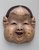 	Kyōgen mask Oto, Edo period, 18th centuryNational Noh Theatre

	In kyōgen, female roles are usually performed without masks, but the oto mask is used to indicate an unattractive, ever-nagging woman. This mask is also employed to portray Buddha and mushroom spirits.